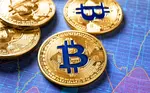 Gold BitCoins on blue background.