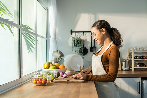 Woman making a Paleo/Keto diet meal. Woman making a Paleo/Keto diet meal.