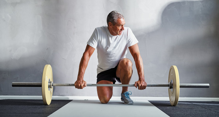 700 senior man kneel olympic bar 700 senior man kneel olympic bar
