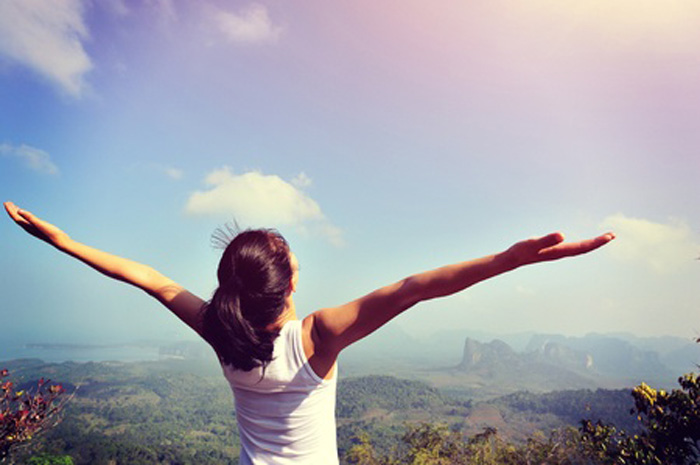 Create your future with your future. Woman excited and thankful on mountain top. Create your future with your future. Woman excited and thankful on mountain top.