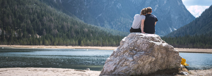 Couple hug at moutain lake. Narrow. Couple hug at moutain lake. Narrow.