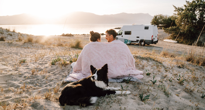 Couple camping hug in blanket. Couple camping hug in blanket.