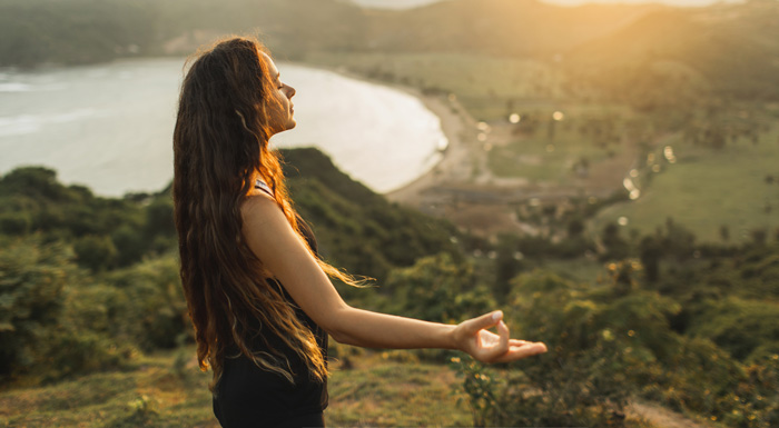 Young woman meditate and manifest outdoors. Numerology and manifestation. Young woman meditate and manifest outdoors. Numerology and manifestation.
