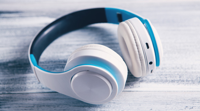 Blue headphones to listen to Amazon Audible books and help to improve your content creation. Blue headphones to listen to Amazon Audible books and help to improve your content creation.