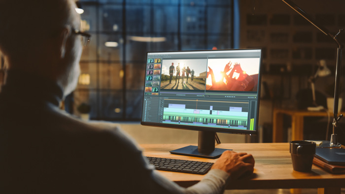 Older man using InVideo to make money by editing scripts. Older man using InVideo to make money by editing scripts.