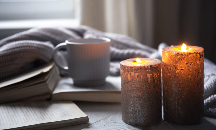 Women writers use scented candles to elevate their spirit and foster creativity.