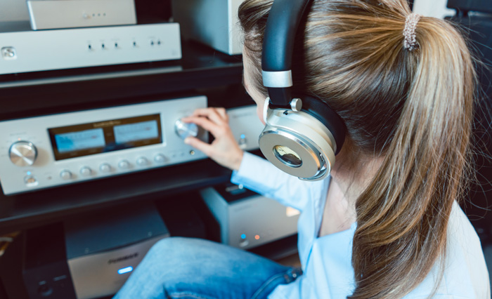 Binaural beats and creativity. Female composer listens to enhance her theta brain waves.