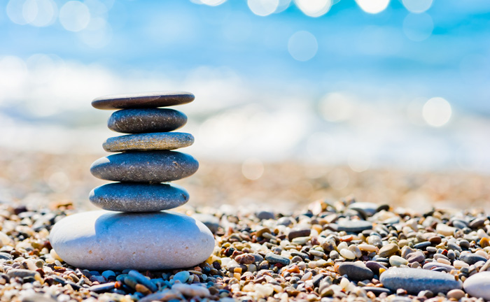 Zen stones on beach. Spiritual awakening. Zen stones on beach. Spiritual awakening.
