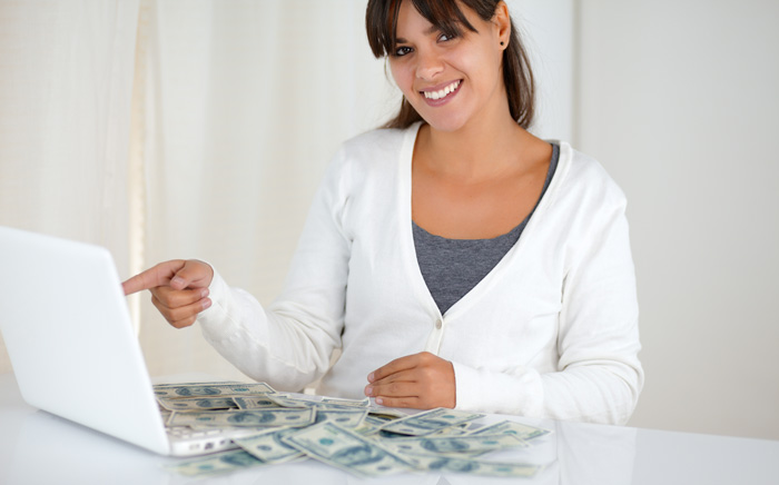 Women with laptop and money she has made from faceless videos with InVideo. Women with laptop and money she has made from faceless videos with InVideo.