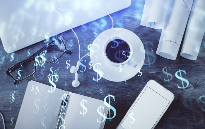 Money signs and a writers desk.