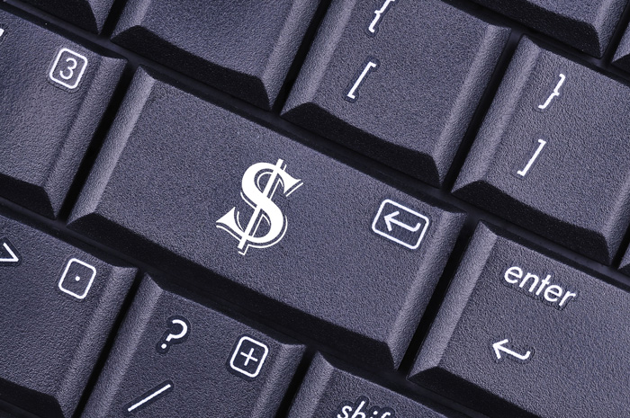 Black keyboard with money sign. Maximizing profits with the Crypto Ultimatum System. Black keyboard with money sign. Maximizing profits with the Crypto Ultimatum System.