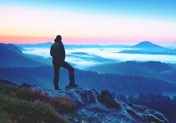 Man on mountaintop. Spiritual awakening. Man on mountaintop. Spiritual awakening.
