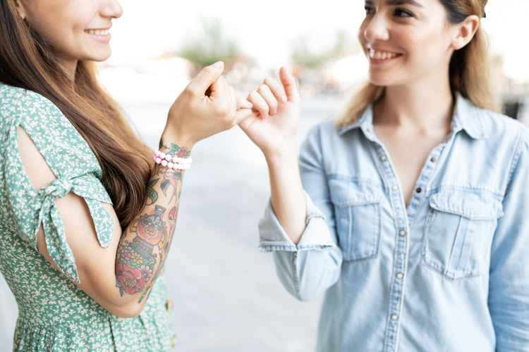 Two young ladies with intentional friendship.