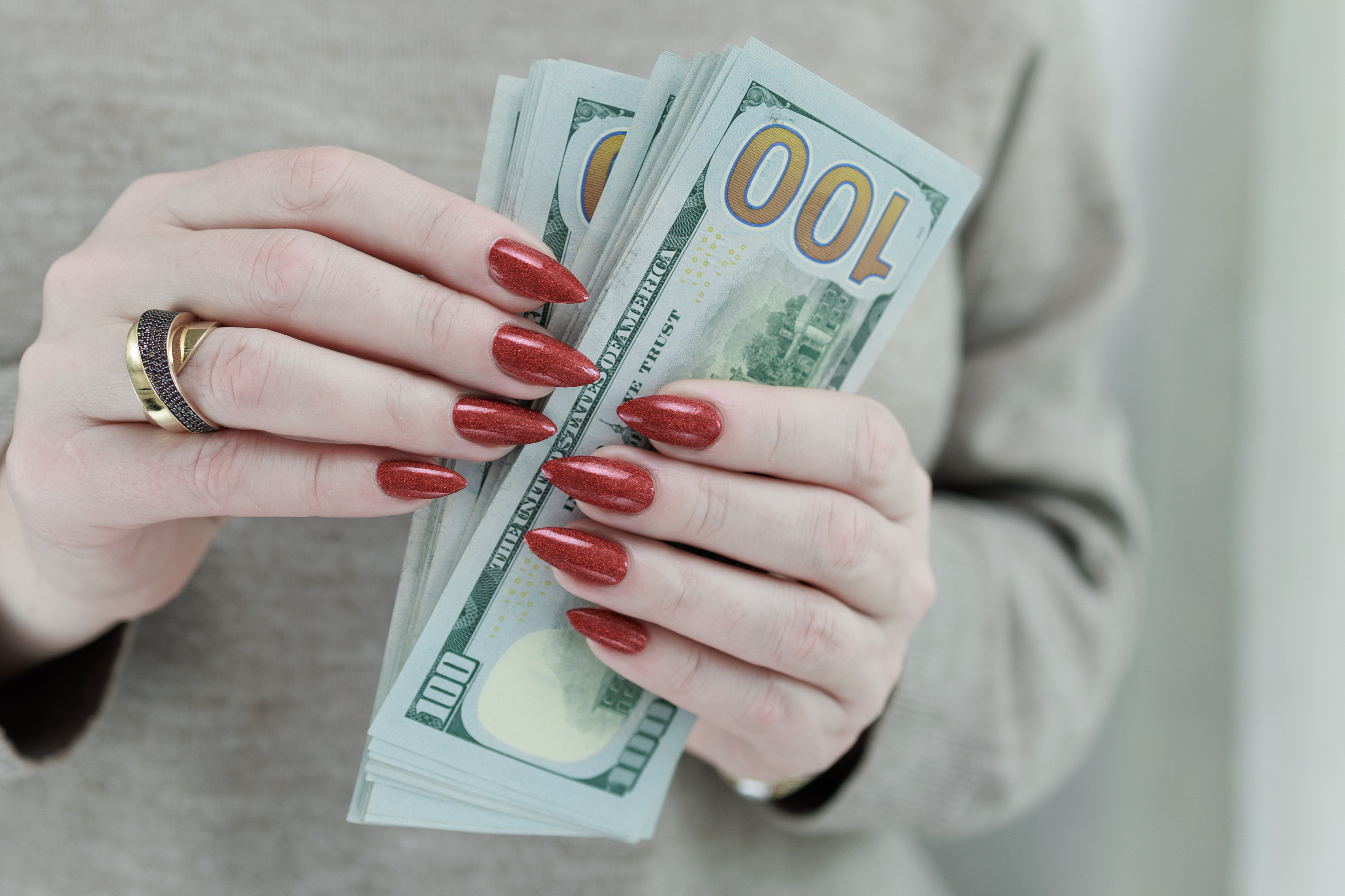 Woman holding crypto profits. Woman holding crypto profits.